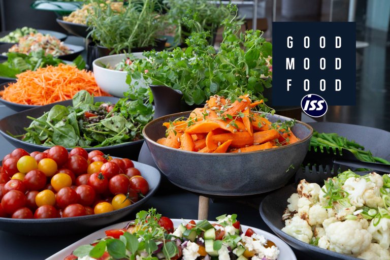 Reklame fra ISS - GoodMoodFood: Salatbar med friske grønnsaker. 